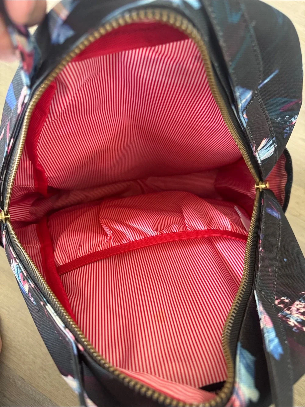 Herschel Supply Company Black Backpack with Blue and Pink Floral Accents